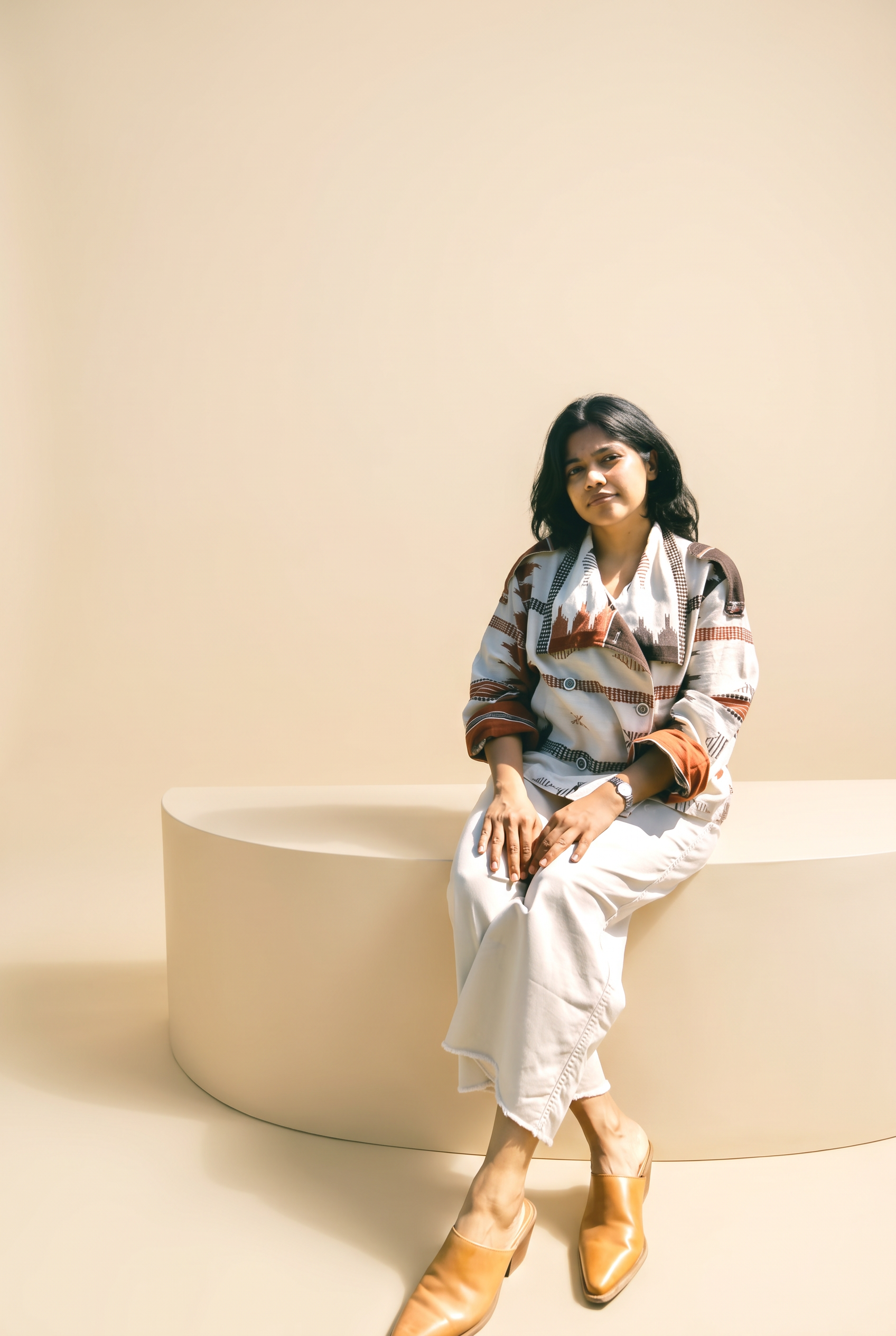 Shreya Mishra wearing the ivory and rust handwoven jacket